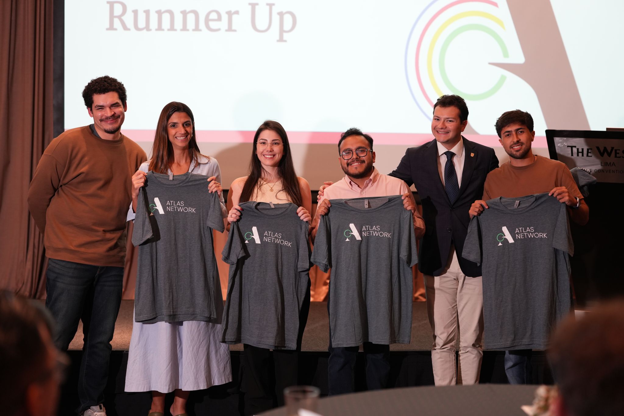 Participantes reconocidos durante el encuentro de Atlas Network en Lima